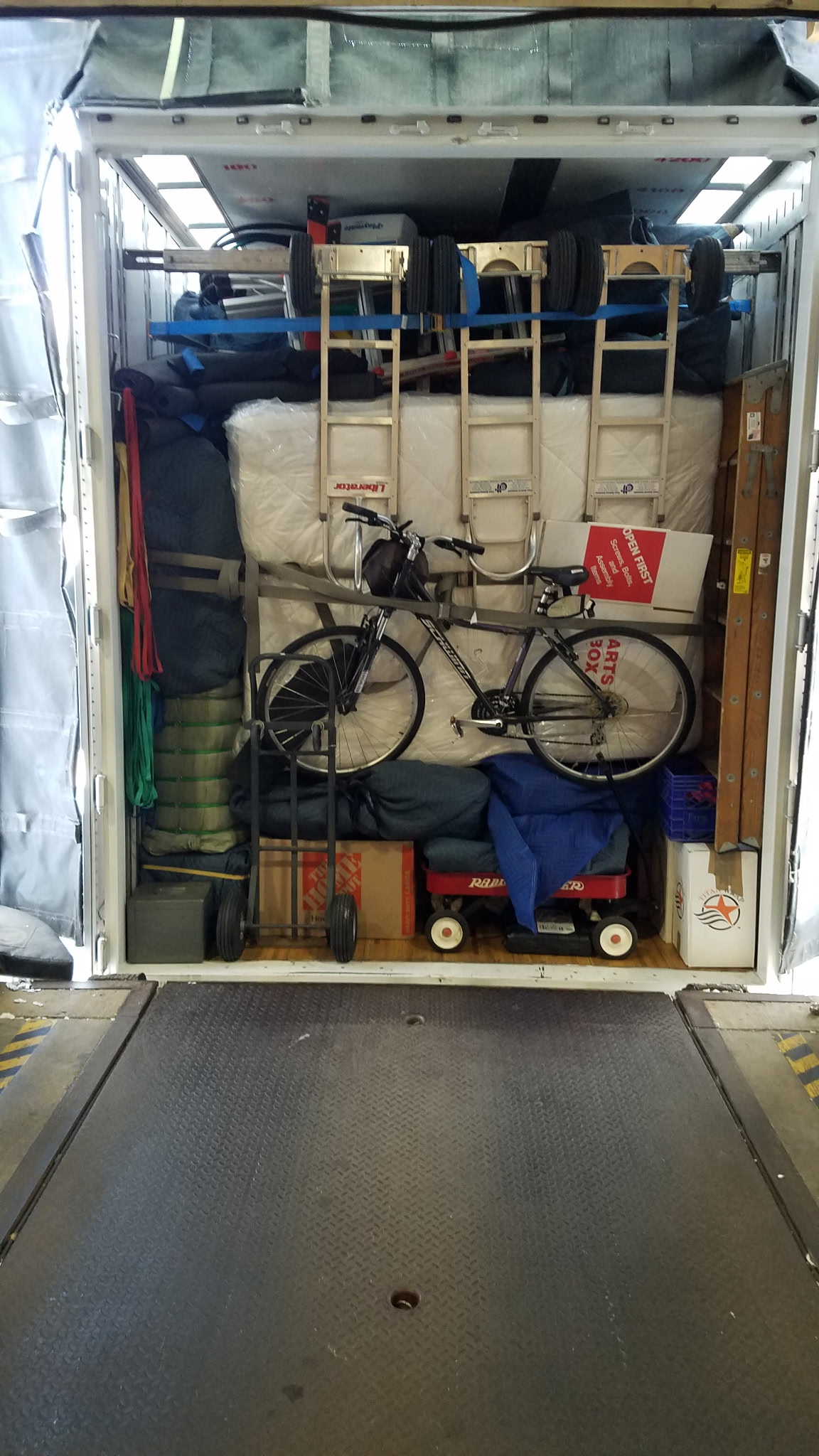 Mantis Moving crew loading truck in Grosse Pointe Farms MI